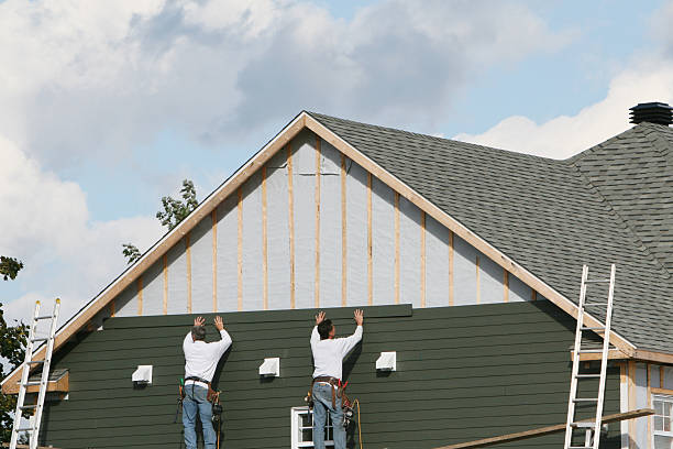 Professional Siding technician working in Springfield, GA